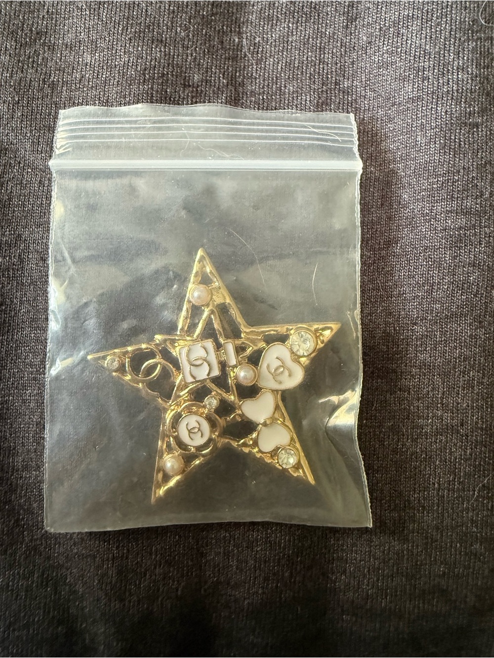 Gold Star Brooch with White Enamel Accents